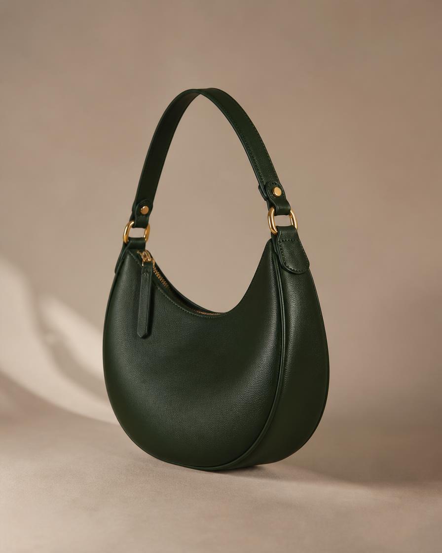 The Pearl Arc — curved shoulder bag, three colours in genuine leather